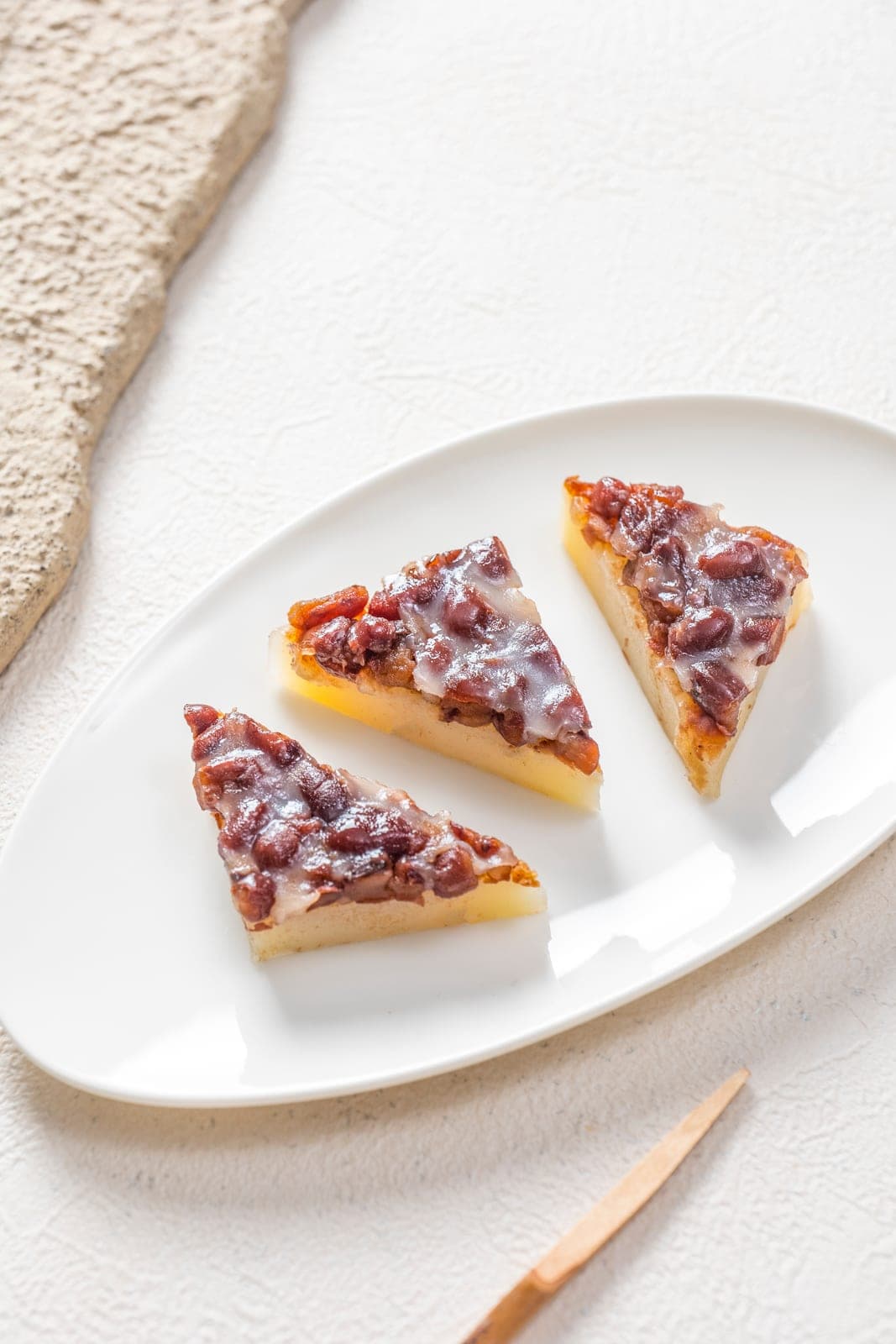 Triangular minazuki topped with sweetened azuki beans